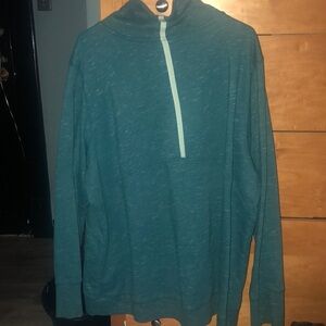 Blue/green sweater. Without the hood and short middle zipper